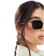 retro black lense sunglasses in gold