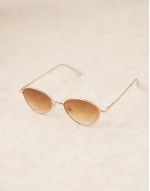 metal cateye sunglass in gold with pink lens