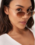 metal cateye sunglass in gold with pink lens