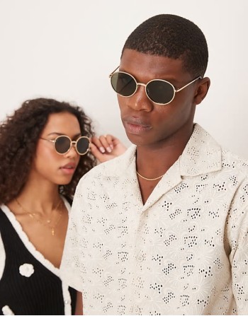 round metal sunglasses in gold with green lens