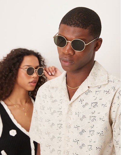 round metal sunglasses in gold with green lens