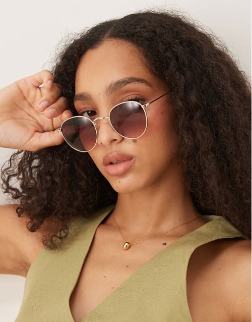 metal round sunglasses with gradient pink lens in gold