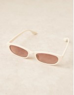 narrow cat eye sunglasses in shiny white